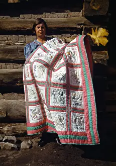Stagg: Mrs. Bill Stagg with state quilt that she ?
