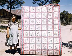 Stagg: Mrs. Bill Stagg with state quilt that she ?