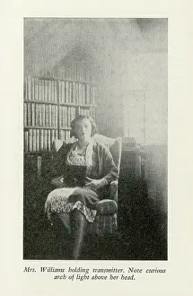 Spectres: Mrs. William holding transmitter