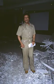 Khaki: Muammar Gaddafi viewing bomb damage, Tripoli, Libya