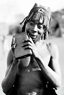 Wamba: Mudumbu with his twelve noted Likhembe type of mbira