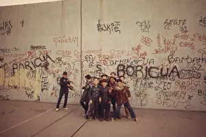 Ghettos: Multi-ethnic group of boys smile in front ?