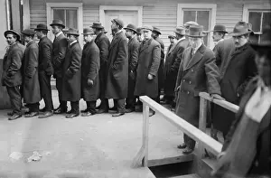 Derbies: Multi-ethnic group of men waiting to apply ?