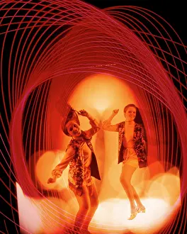 Discotheque: Multiple Exposure Woman Dancing Amid Psychedelic Lights