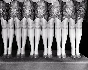 Outrageous: Multiple Exposure of Woman's Legs Wearing Silk