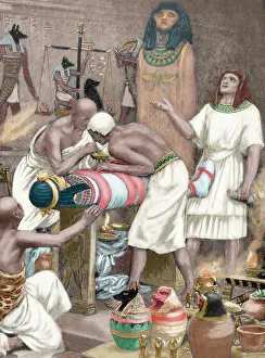 Mummy: Mummification. Anciet Egypt. Engraving. 19th century. Colore