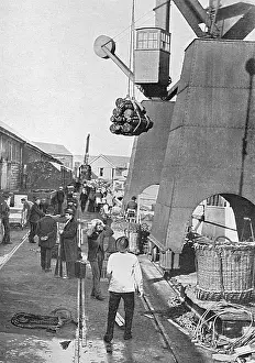 Dockyards: Munitions being loaded onto battleship, WW1