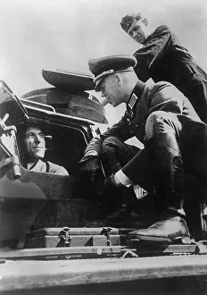 Instructs: Munitions workers visit a tank division, 1942