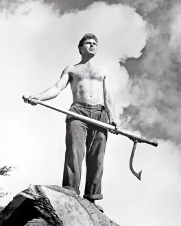 Tolls: Muscular Bare Chested Worker - Lumber Man