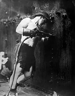 Riveter: Muscular riveter at work at Hog Island Shipyard