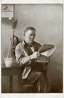 Dec15: A musician takes a break to read Tit-Bits