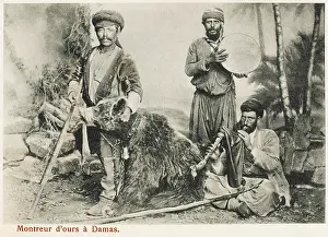 Musicians and a performing bear - Syria
