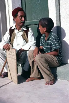 Pupil: Muslim teacher and pupil at Sirte, Libya
