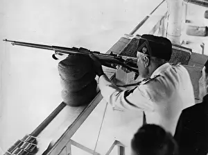 Phtography: Mussolini at a shooting gallery