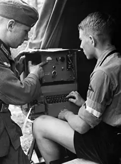 Receiver: Nachrichten-HJ member learns to work on the telegraph, 1