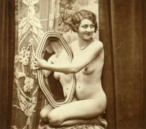 Erotica: Naked model posing in a sexy glamour pose