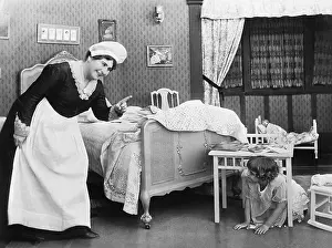 Sitter: Nanny and child playing hide and go seek