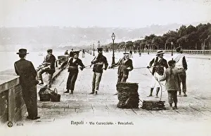 Caracciolo: Naples, Italy - Fishermen pulling in their catch