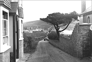 Ponsonby: Narrow road through a Devon village