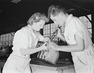 Servicing: National Youth Administration trainees during