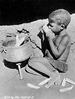 Corn: Native African Matabele boy eating
