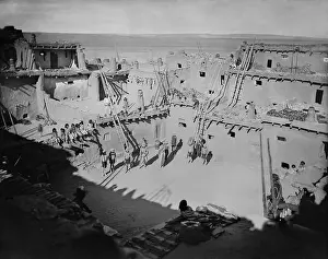 Hillers: Native American spectators sit on an upper