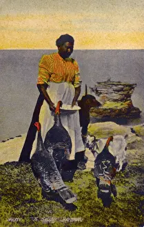 Clifftop: Native Bermudian feeding her flock of turkeys