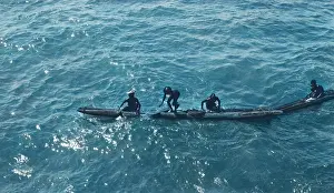 John Maclellan: Native boatmen with canoes
