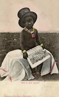 Weekly: Native boy reading Cape Argus newspaper, South Africa