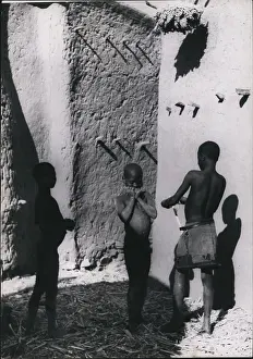 Flutes: Native children making their own flutes and playing them