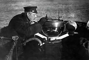 Compass: Naval officer at a ship's compass, 1916