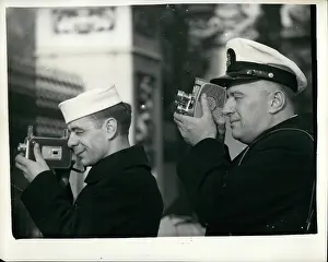 Connolly: US naval officers taking photographs