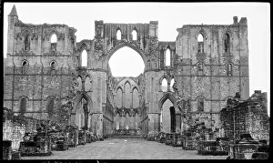 Uppermost: Nave and choir from inside the ruins at Rievaulx Abbey