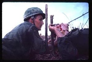 Quang: Navy corpsman provides medical support for a wounded