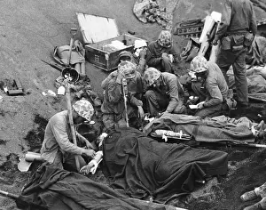 Corpsmen: Navy doctors and corpsmen treat seriously wounded