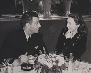 Instructional: Navy Lieutenant Robert Taylor, with his wife