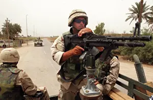 Maintains: A US Navy serviceman maintains security for his