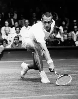 Neale: Neale Fraser in tennis match at Wimbledon