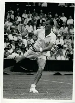 Neale: Neale Fraser in tennis match at Wimbledon