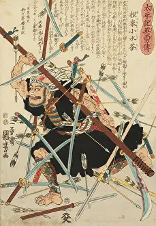 Negoro no komizucha dressed as a warrior monk, fighting