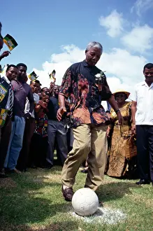 Madiba: Nelson Mandela, watched by local residents and