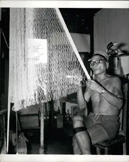 Injection: Net maker in leprosy settlement, Sarawak
