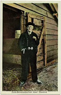 Dec15: The Netherlands - Dutch Farmer outside his barn