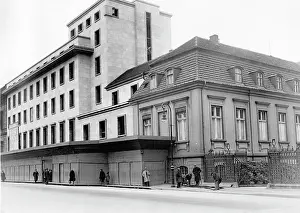 Craftsmen: The New and Old Reich Chancellery from the front, 1930