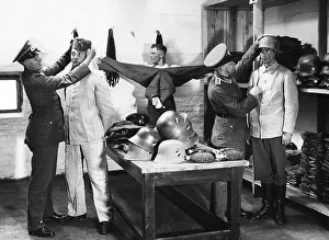 Garb: New recruits are dressed up, 1934