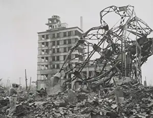 Pacific Region: News photographer (lower left) documenting ruins