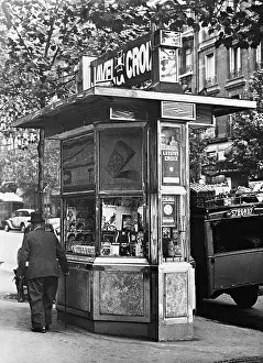 Periodicals: Newspaper kiosk in Paris, 1937