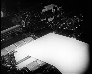 Presses: Newspaper Rolling Off the Printing Presses