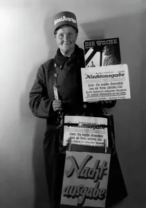 Vendors: Newspaper vendor, 1937
