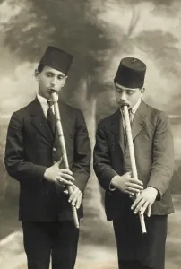 Seeker: Two ney-playing Dervishes practising